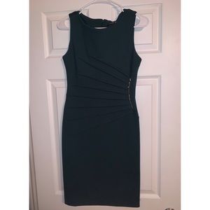 Green Ivanka Trump dress with gold accent zipper